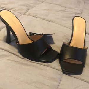 NWT- black slip on heels